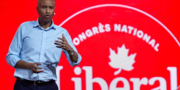 Immigration minister says he was target of racial profiling, calls on Liberals to fight racism