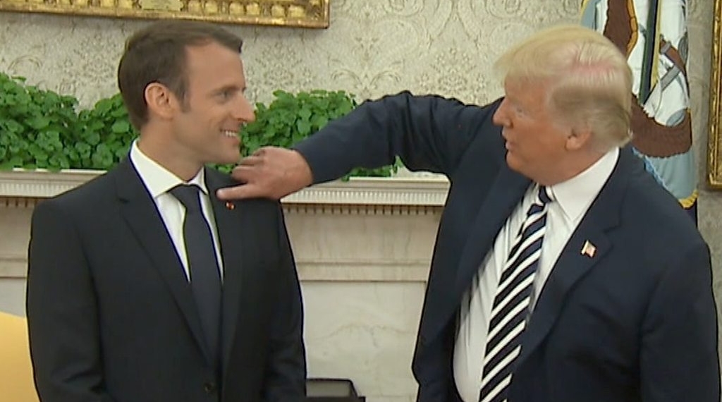 Trump brushes 'dandruff' off 'perfect' Macron