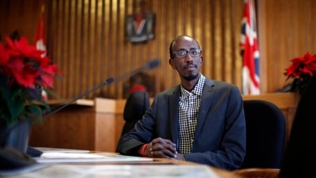 He once crossed the ocean by moonlight as a refugee. Now he’s a city councillor in B.C.