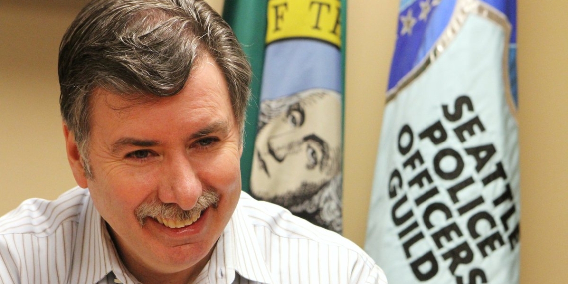 Controversial Seattle police union leader to retire, then return in bigger role