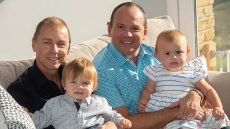 This English same-sex couple fathered twins who are half-siblings — and a Canadian surrogate helped them