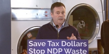 Kenney pledges to save province $200M by privatizing AHS laundry service