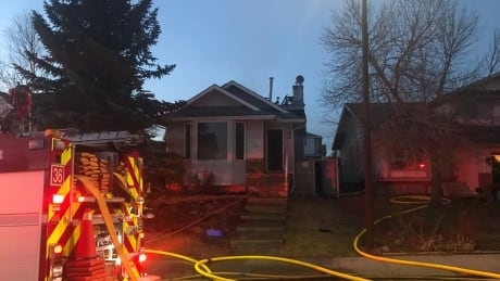 Crews battle house fire in northwest Calgary