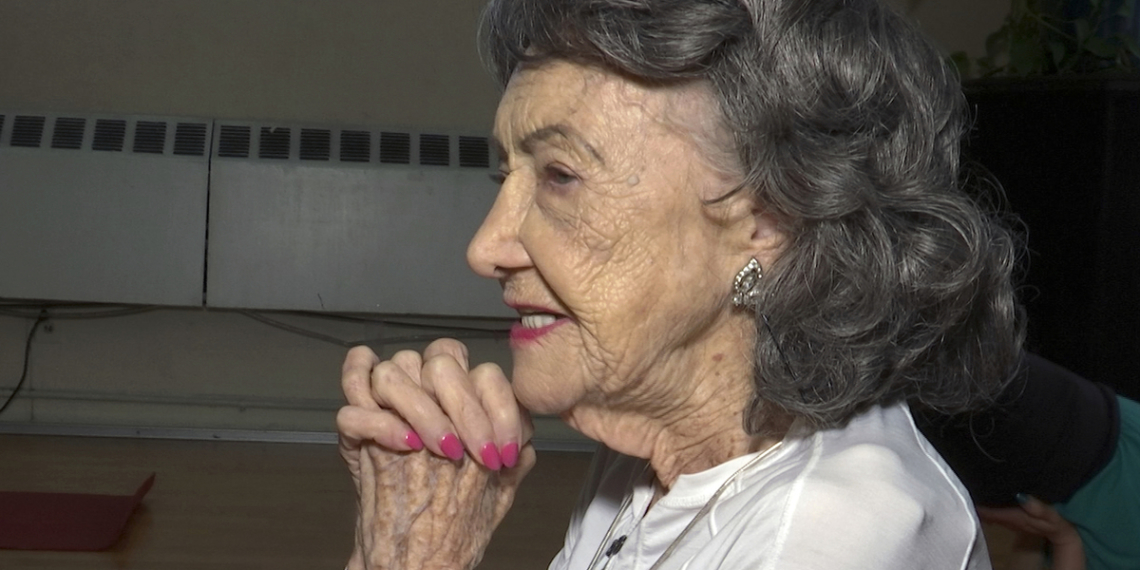 100-year-old yoga instructor keeps moving, dancing