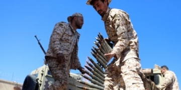 Tripoli under attack as Libyan power struggle escalates, international groups pull out