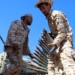 Tripoli under attack as Libyan power struggle escalates, international groups pull out