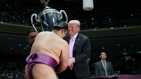 ‘A great day’ of golf, sumo and sushi in Japan for Trump