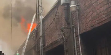Firefighters battle major blaze in Ballard retail district