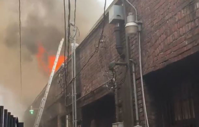 Firefighters battle major blaze in Ballard retail district