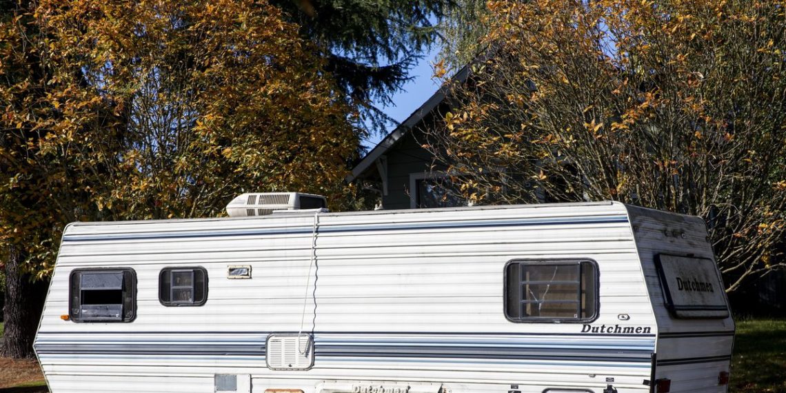 A trailer showed up in front of a Seattle councilmember’s home. Is it a political stunt? Or a coincidence?