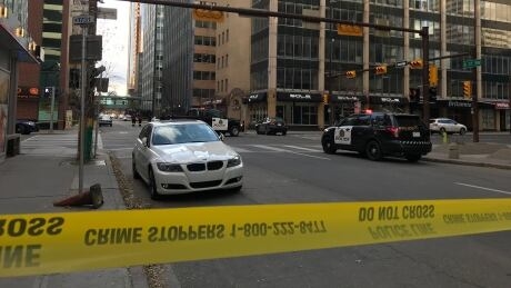 2 taken to hospital after downtown Calgary officer-involved shooting