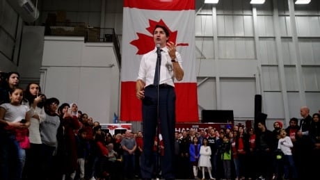 Trudeau, Scheer dodge questions, trade barbs on final push to election day