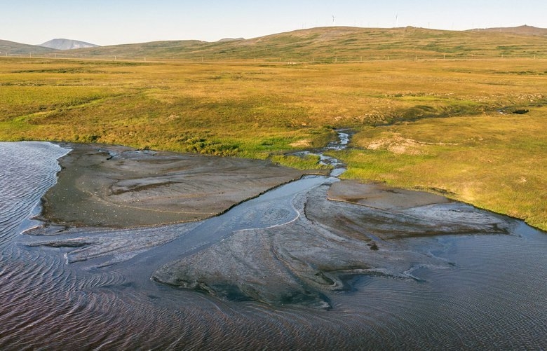 As climate change melts Alaska’s permafrost, roads sink, bridges tilt and greenhouse gases release