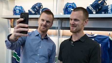 Former Canucks Daniel, Henrik Sedin happy in their retirement