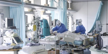 China reports major drop in new virus cases; 143 new deaths