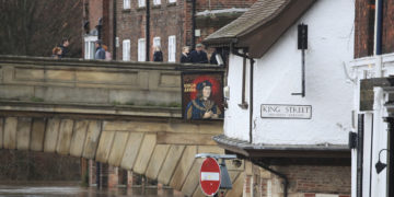 UK issues severe flood warnings; storm injures 9 in Germany