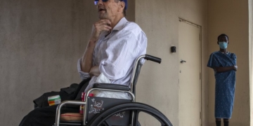 At hotels for homeless Seattleites, fear and frustration outside but comparative calm within