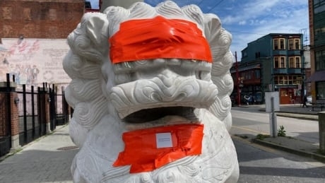 Vancouver’s Chinatown lions defaced by racist graffiti for second time