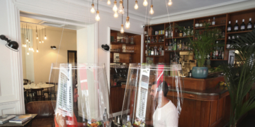 Patrons under plastic: Restaurants get creative in virus era