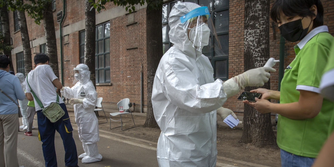 AP PHOTOS: A first-person view inside Beijing’s virus tests