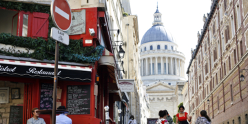 AP PHOTOS: Croissants and hand gel as Paris cafes reawaken