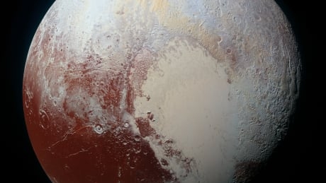 Frigid Pluto began as a warm place with an underground ocean, study suggests