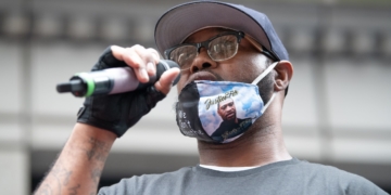 Families of Eric Garner, George Floyd, Breonna Taylor join protesters in march against police brutality from Times Square to Trump Tower