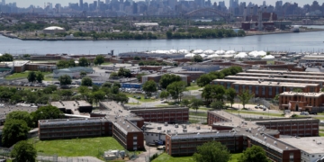Former Rikers guard pleads guilty to smuggling scheme at jail complex