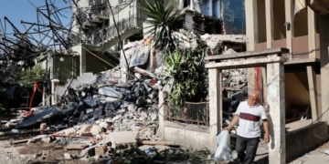 French President arrives in Beirut to express support following massive explosion