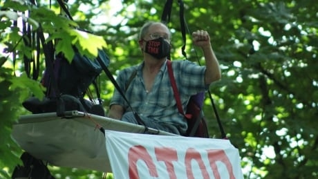 SFU professor mounts high-altitude protest against Trans Mountain pipeline expansion