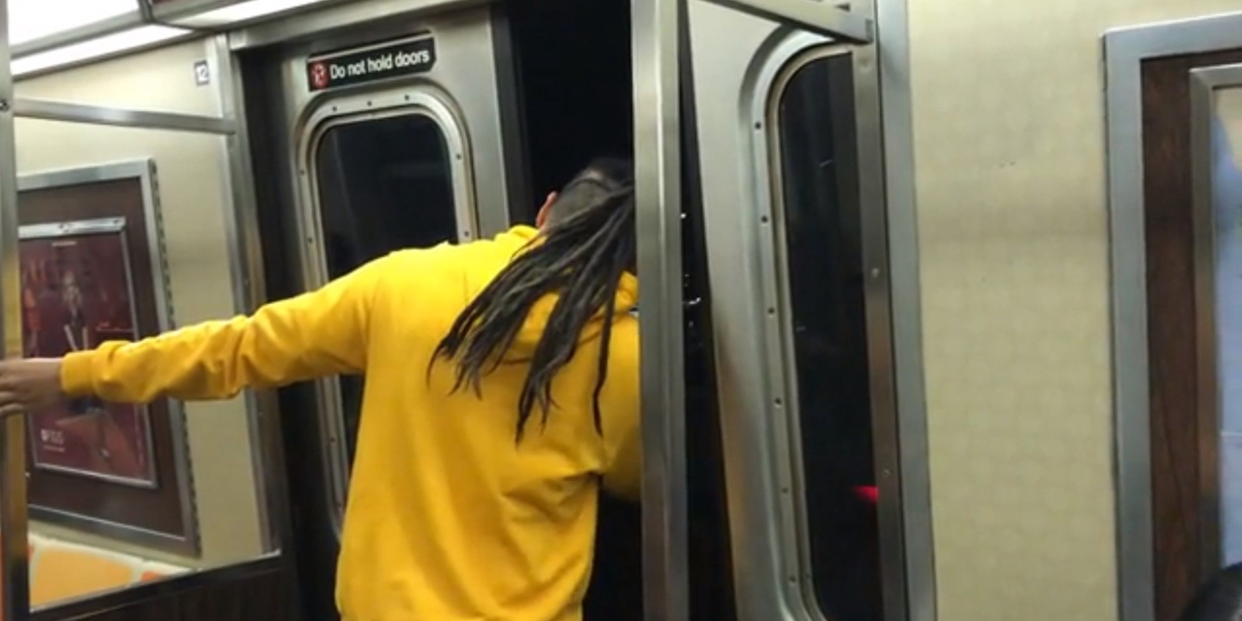 SEE IT: Door opens on Q train rolling over Manhattan Bridge