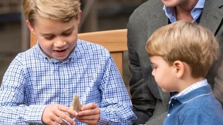 David Attenborough gives shark tooth fossil to 7-year-old Prince George