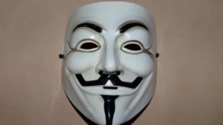 Man in Guy Fawkes mask threatened police with knife before fatal shooting, inquest hears
