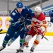 Canucks game against Flames called off with 2 players, coach in COVID-19 protocols