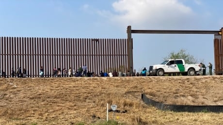 At U.S.-Mexico border, a new U.S. president spurs hope and rush to enter