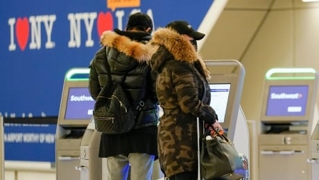 Non-essential travel a low risk for the vaccinated, CDC says in new guidance for Americans