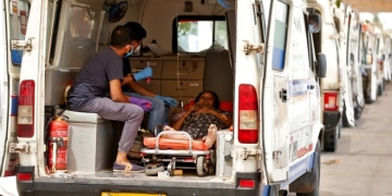 COVID-19 surge slams India's health system, death toll tops 200,000