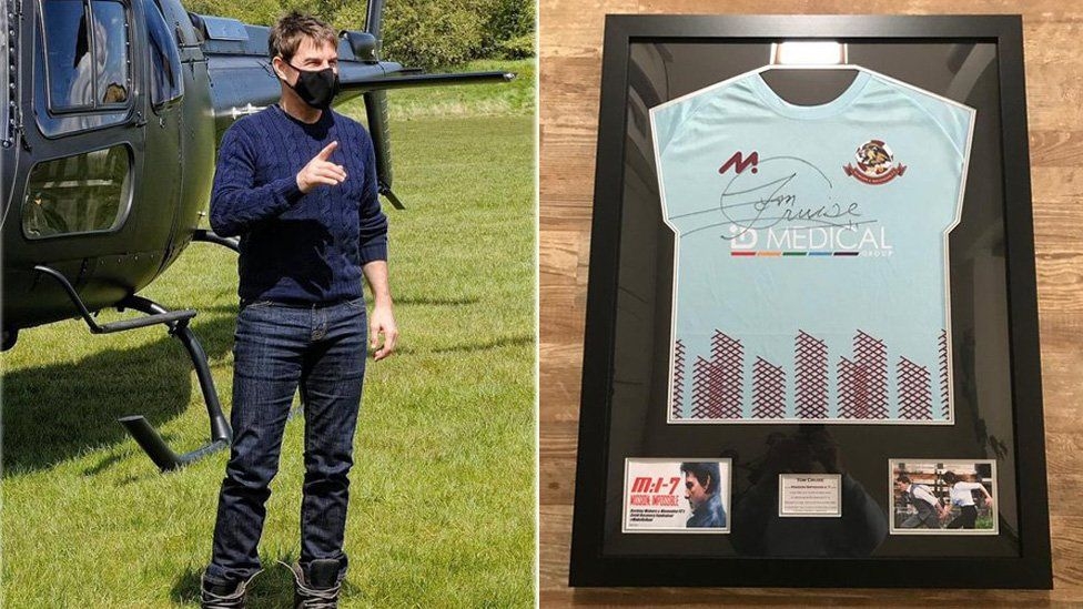 Covid: Tom Cruise signs shirts for football club on movie set