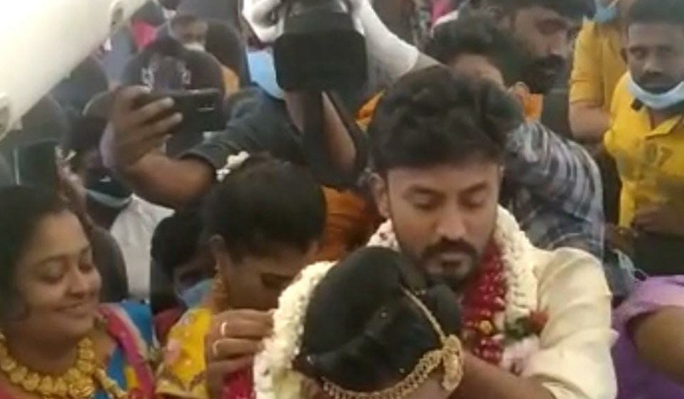 Indian couple holds mid-air wedding 'to escape Covid restrictions'
