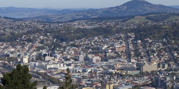 New Zealand fugitive charters helicopter to police station