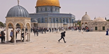 Palestinians claim victory in ceasefire as Israel issues warning to Hamas