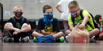 As summer approaches, how can parents prepare for another season of COVID-19?