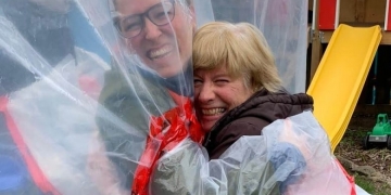 Hug Glove hanging sheet rolls out for safe embrace