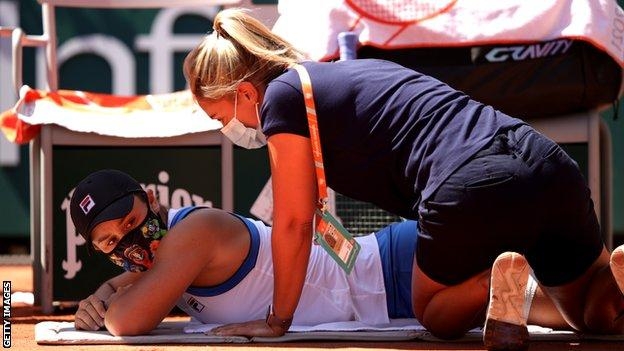 French Open 2021: Ashleigh Barty survives injury scare to reach second round