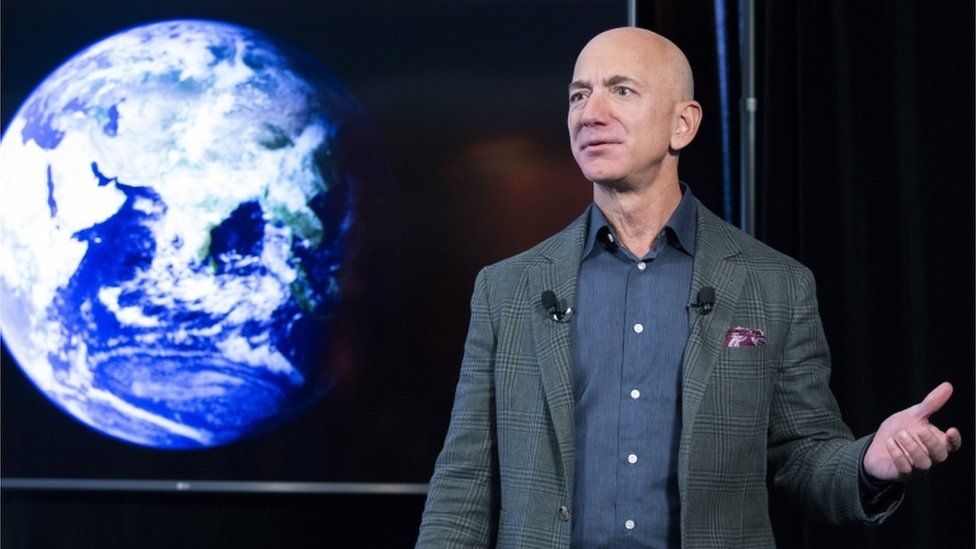 Jeff Bezos and brother to fly to space in Blue Origin flight