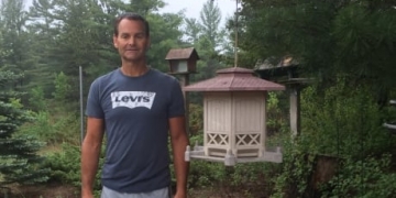 A black bear visits this man's Ipperwash Beach home at night