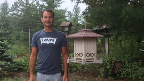 A black bear visits this man's Ipperwash Beach home at night