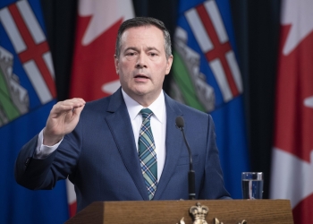 Kenney announces Alberta vaccine passport program ending at midnight: Masks ends Mar. 1