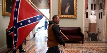 Man who carried Confederate flag in US Capitol and son found guilty of felonies