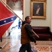 Man who carried Confederate flag in US Capitol and son found guilty of felonies